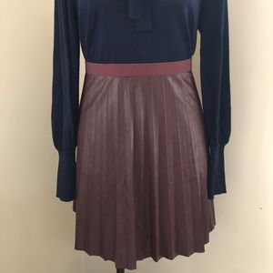 Vegan leather pleated mini skirt
